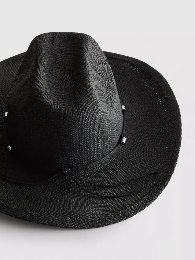 Trimmed straw cowboy hat