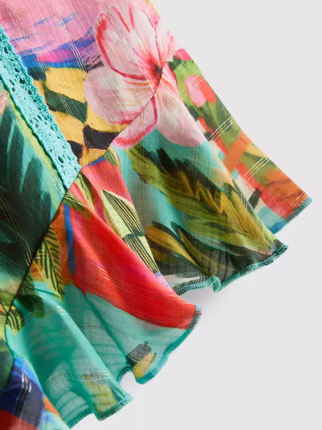 Tropical printed frill shorts
