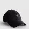 Tufted initial cap