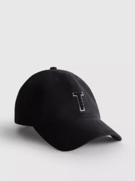 Tufted initial cap