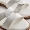 Twisted-strap mule sandals