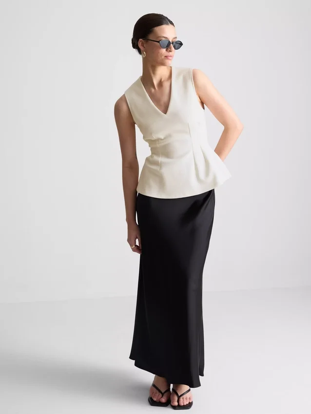 V-neck peplum sleeveless top