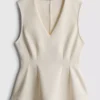 V-neck peplum sleeveless top