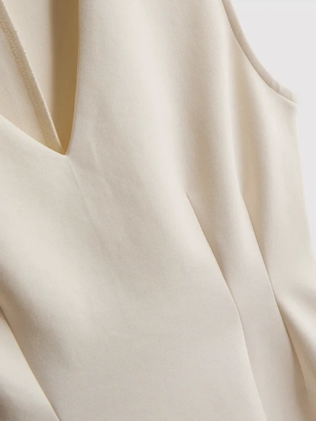 V-neck peplum sleeveless top