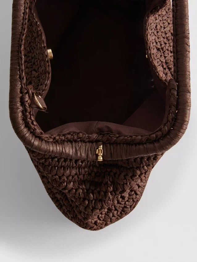 Woven clutch bag