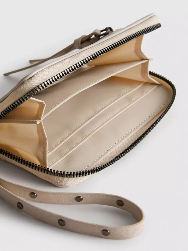 Zip around wristlet wallet
