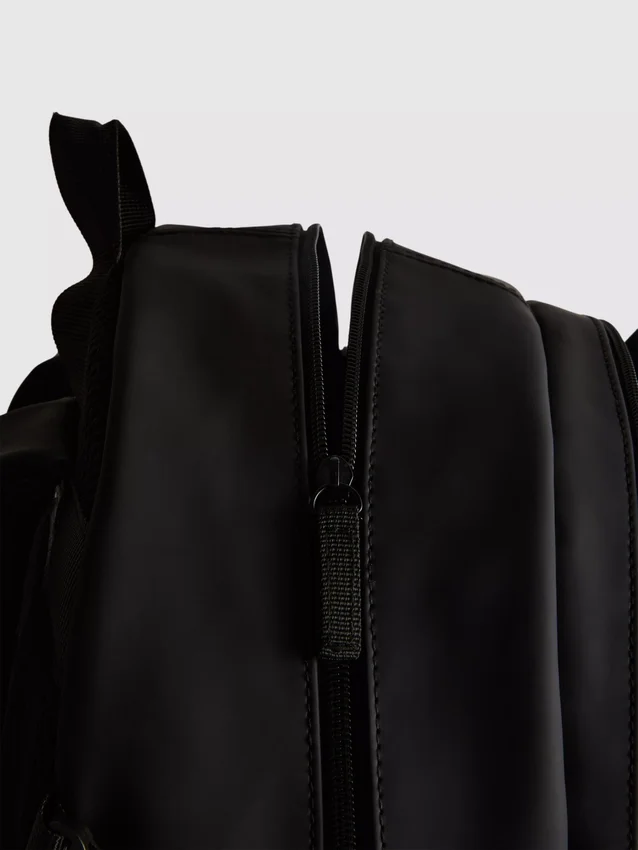 Zip-up commuter backpack