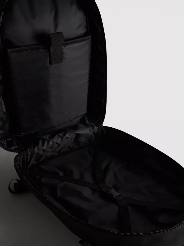 Zip-up commuter backpack