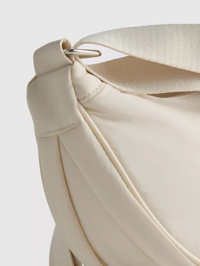 Zipped sling bag