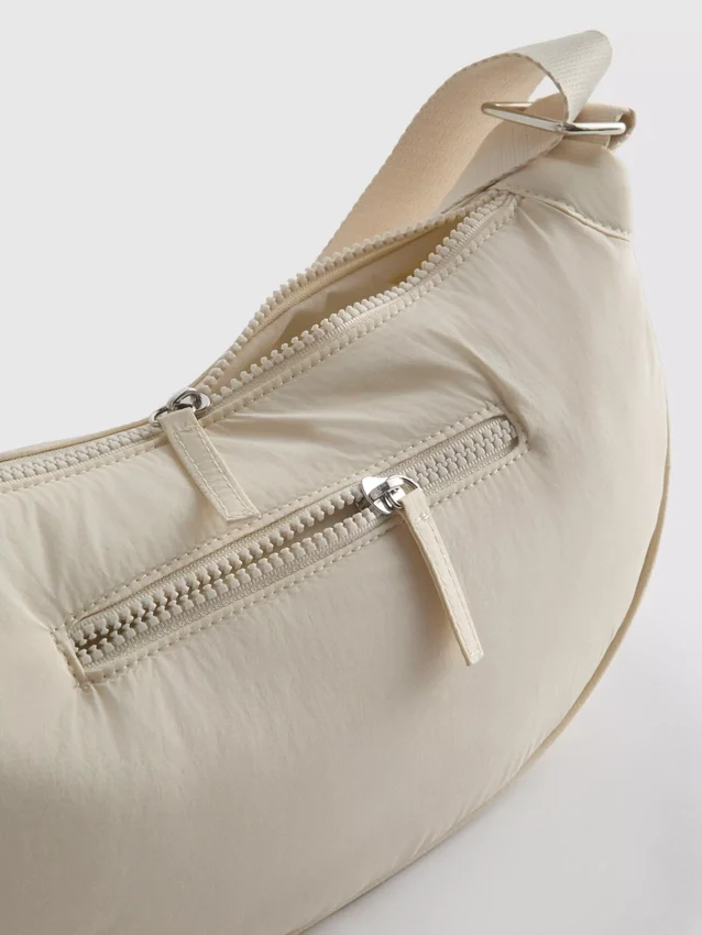 Zipped sling bag