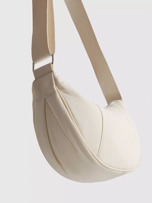 Zipped sling bag